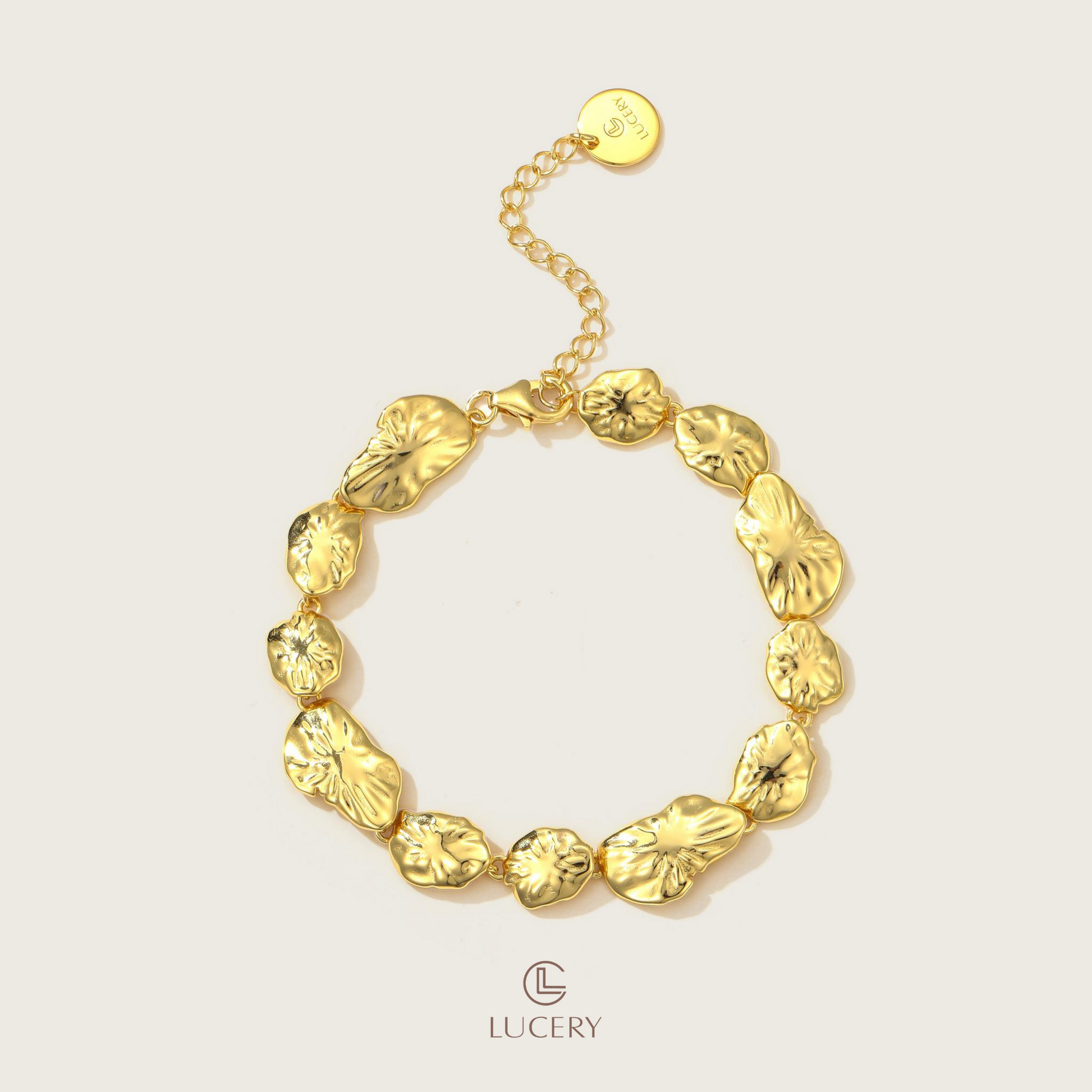 This bracelet, a showcase of nature-inspired design, features irregular golden discs reminiscent of woodland treasures, all in 18K gold-plated S925 silver. Each textured piece catches the light uniquely, making it a bold statement of natural beauty.