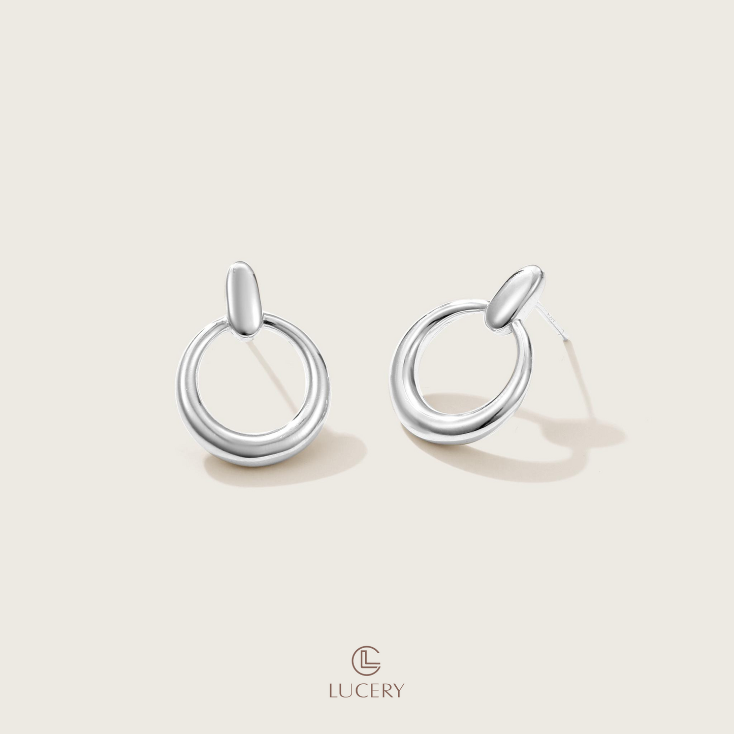 Sleek and sophisticated, these Minimalist Hoop Earrings are the epitome of understated elegance. Plated with 18K gold over a solid S925 silver base, they offer a timeless look for any occasion.