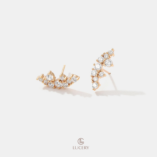 Embrace nature's elegance with our Whimsical Sparkle Leaf Earrings, intricately designed with a leafy motif that glimmers with every movement, capturing the enchanting dance of light.