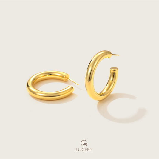 The Minimalist Open Hoop Earrings capture the essence of contemporary elegance with a simple yet striking design. Their subtle opening adds a unique twist, making them a chic addition to any modern jewelry collection.