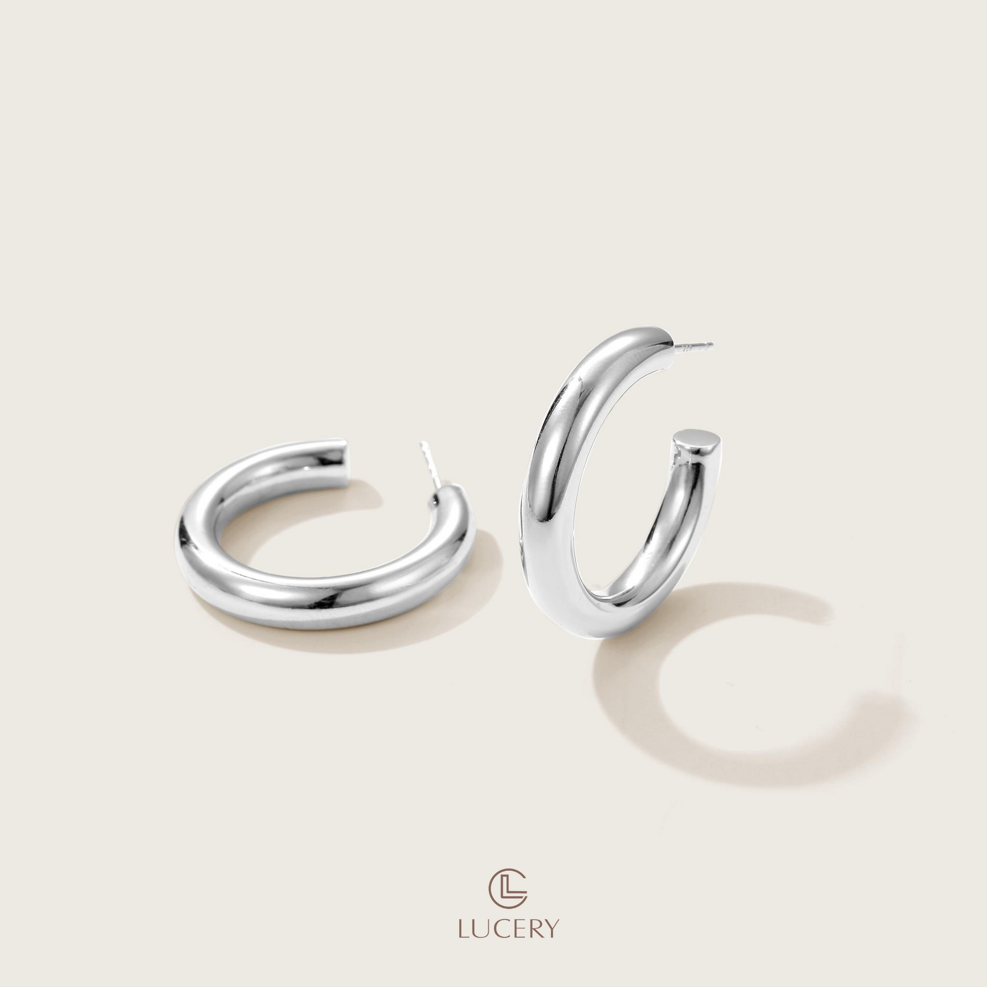 The Minimalist Open Hoop Earrings capture the essence of contemporary elegance with a simple yet striking design. Their subtle opening adds a unique twist, making them a chic addition to any modern jewelry collection.