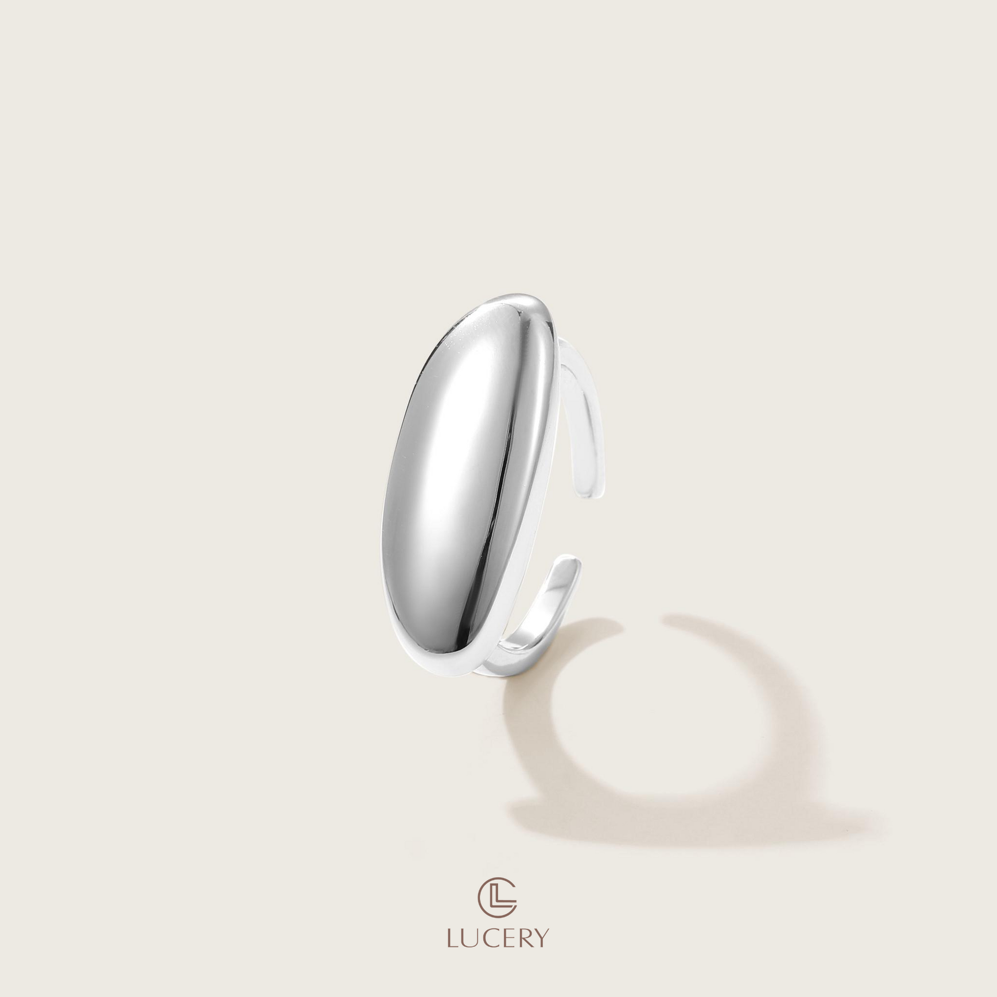 Embrace uniqueness with our Golden Bean Silhouette Ring, a smooth, bean-shaped creation that complements the bold spirit. Its sleek form is a nod to unconventional elegance.