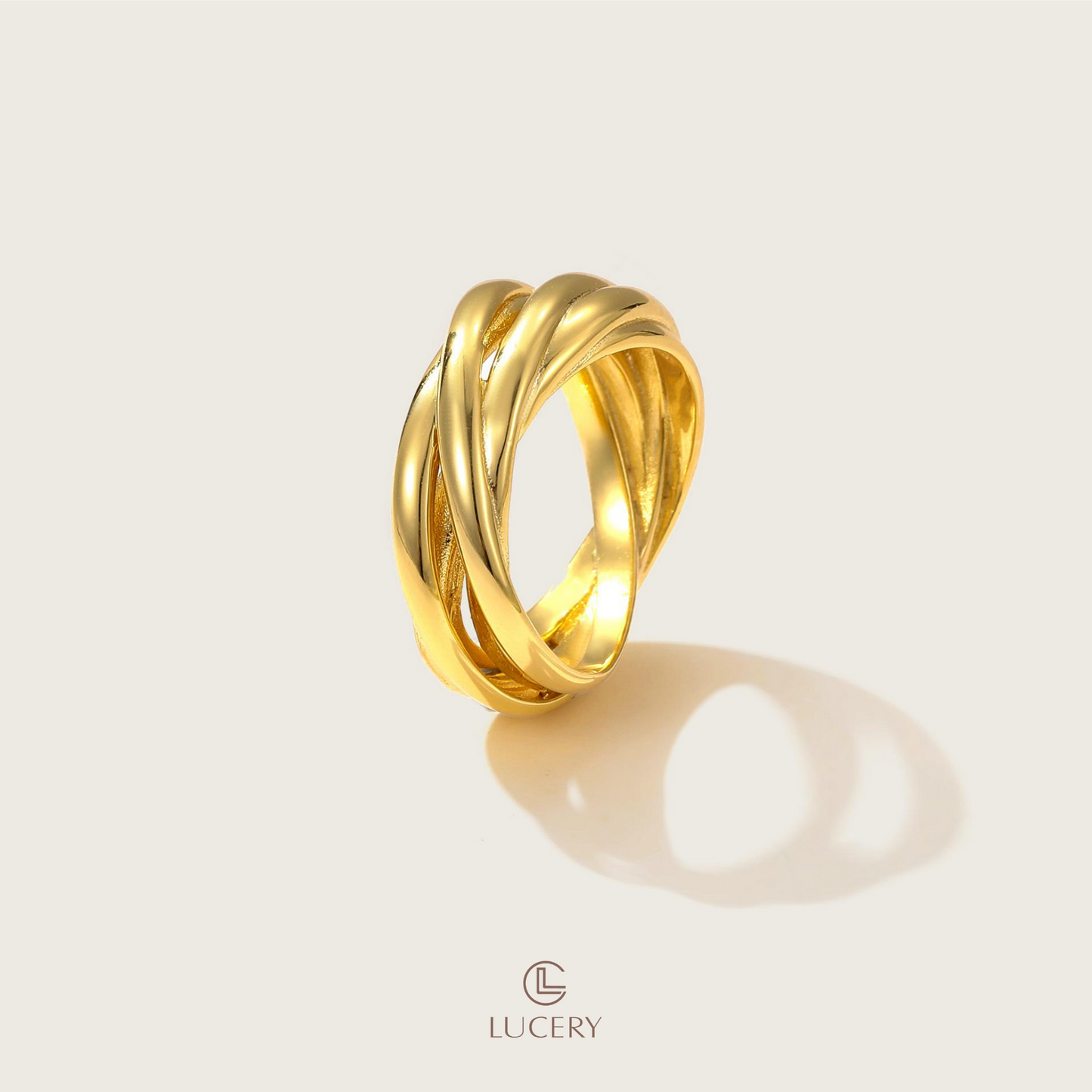 This ring is a testament to timeless elegance with its intertwining bands of 18K gold-plated S925 silver, symbolizing unity and strength. Its polished finish and dynamic form make it an exquisite addition to any jewelry collection.