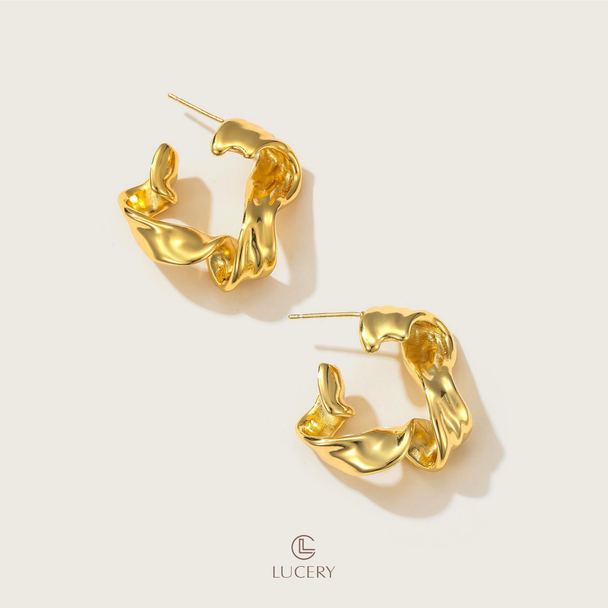 Ignite your style with these Sculpted Flame Hoop Earrings, featuring a bold twist that mimics the dynamic shape of flames. They offer a statement piece that's both fiery and fashionable, perfect for elevating a chic, edgy look.